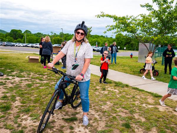 Students bike to school in the morning.